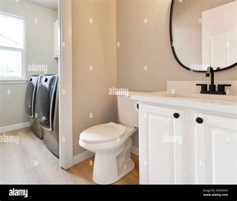 Modern Residential Bathroom And Laundry Room Interior Stock Photo Alamy