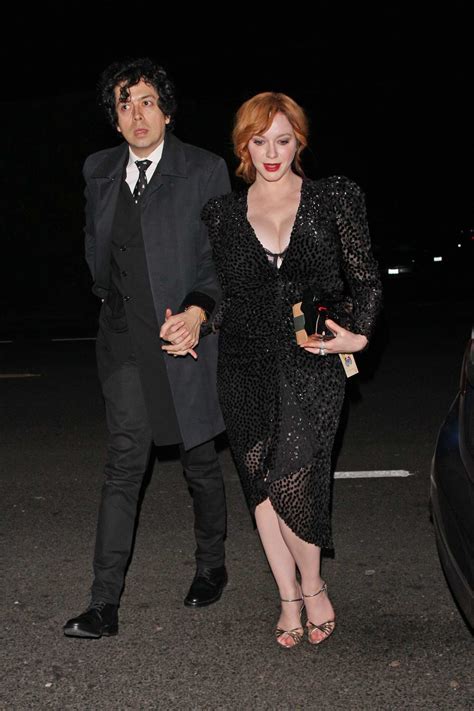 Christina Hendricks And Husband Geoffrey Arend Arrives At Jennifer Kleins Holiday Party In Los
