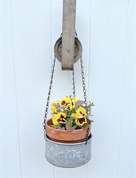 Hanging Planter And A Vintage Pulley