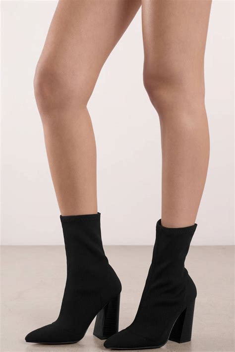 Sock boots are still going strong. Ariana Black Knit Sock Booties - $70 | Tobi US