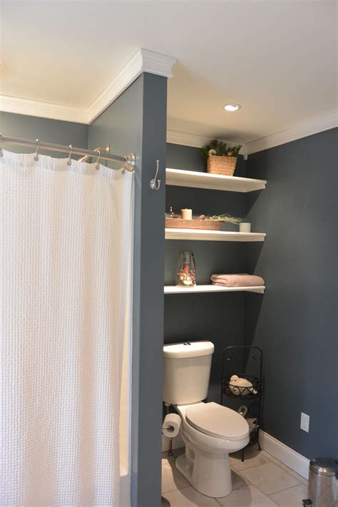 Privacy Wall For The Toilet And Functionality With The Shelving Full