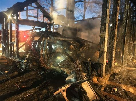 Photos Garage Fire Engulfs 2 Vehicles Damages House
