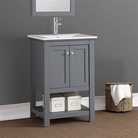 It's made from solid and engineered wood with a white granite countertop around a ceramic undermount sink, plus a matching backsplash to protect your walls. Fresca Manchester 24" Gray Traditional Bathroom Vanity