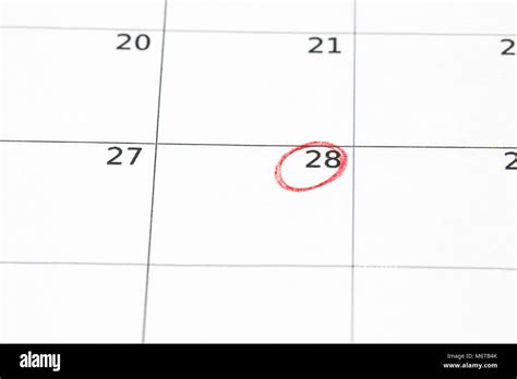 Save The Date Written On The Calendar 28 Circled In Red Marker Stock