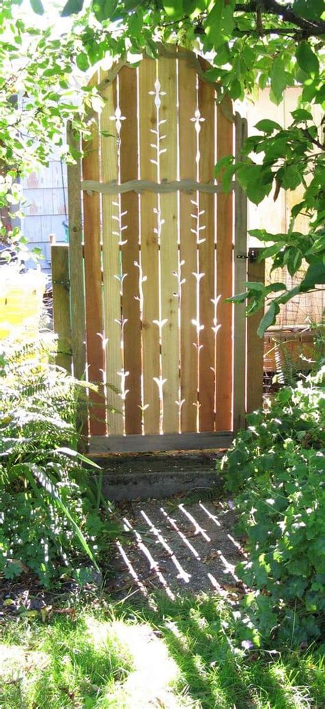 This bare wood arbor and gate create a homey welcome to a garden space without going stone pavers lead the way to a charming stacked stone garden gate that features a unique door with circular. Beautiful Garden Gates! Home Inspiration