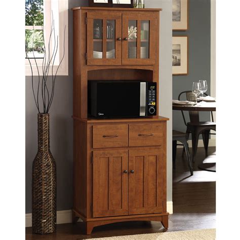 The upper glass paneled one shelf cabinet offers storage or display options. Oak Hills Microwave Cabinet By Home Source | Microwave cabinet