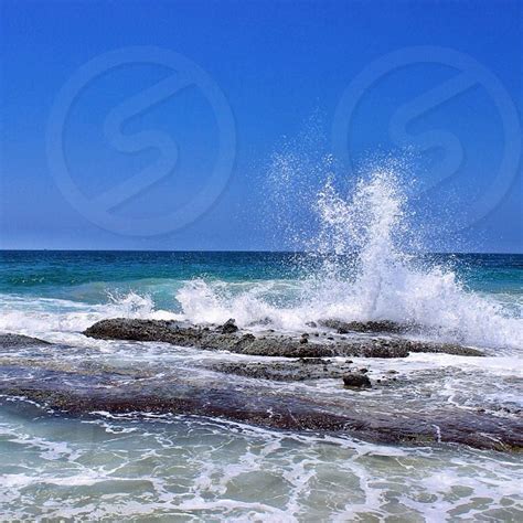 Ocean Wave Hitting Rock Formation By Jorge Carneiro Photo Stock