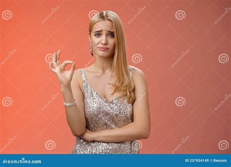 Well Not Bad Hesitant Unsure Cute Stylish Wealthy Blond Girlfriend In Silver Dress Frowning