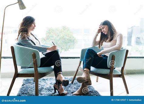Sad Woman With Therapist In Office During Her Visit Stock Image Image