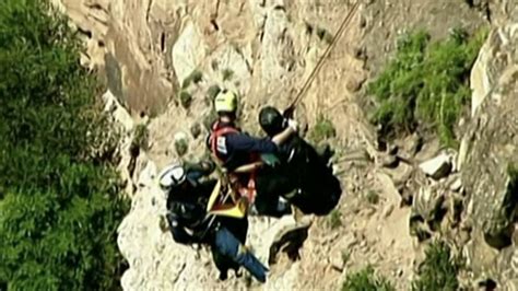Watch Rescuers Help Hang Glider Dangling From Cliff Today Com