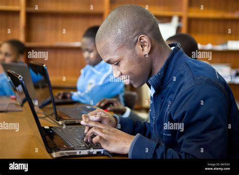 A Class Of South African School Children Concentrate On Laptops During
