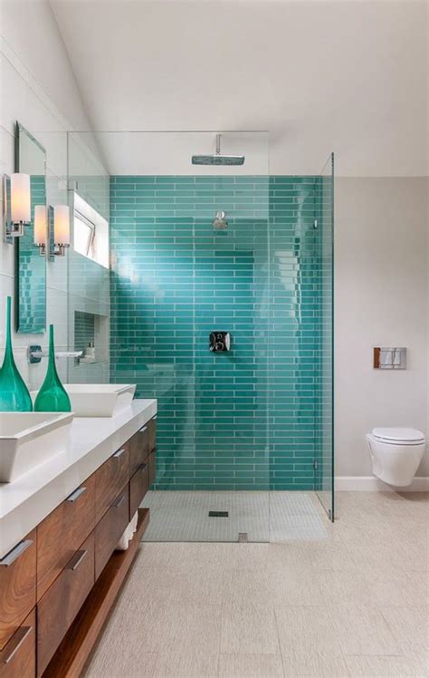 Modern bathroom with tile made from recycled content and bamboo cabinets. 40 blue glass bathroom tile ideas and pictures