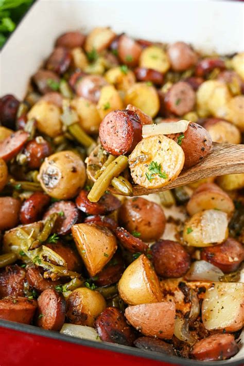 In a pan, arrange the sausage, potatoes and peppers and place the butter over the top in small cubes. Sausage, Green Bean Potato Bake - Butter Your Biscuit