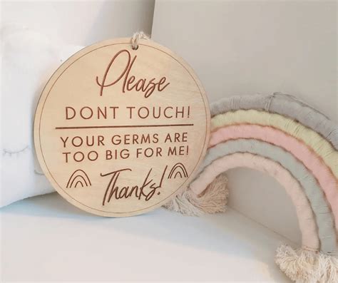 Keep The Germs Away From Your Little One With These Hanging Signs