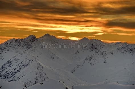 Parsenn Mountain Swiss Alps Panorama In Winter Sunset Stock Photo