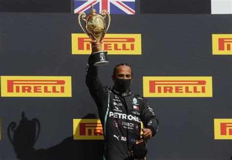 f1 pix hamilton wins british gp with punctured tyre rediff sports