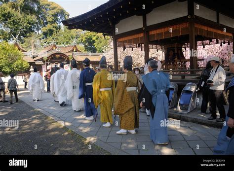 Shinto Priests Proceed To Worship Shrine Festival During The Cherry Blossom At The Hirano
