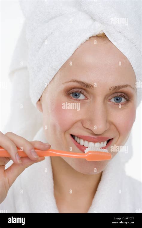 Woman Brushing Teeth Stock Photo Alamy