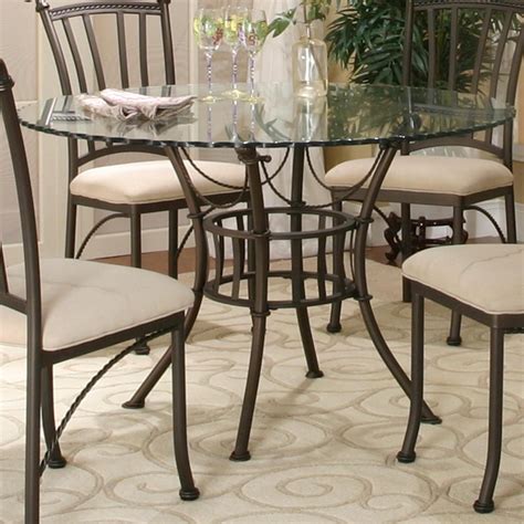 Glass dining tables come in various styles, but the one that never goes out of fashion is a modern glass dining table set that can enhance a dining room's look instantly. Cramco, Inc Denali Round Glass Table Top with Molten Earth ...