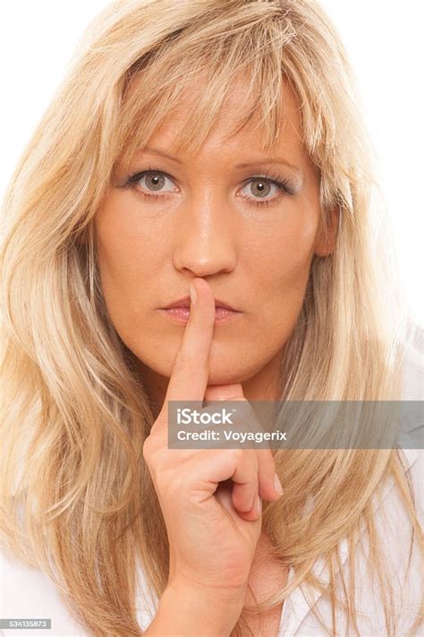 Woman Asking For Silence Finger On Lips Hush Gesture Stock Photo