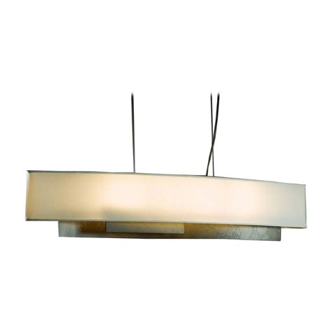 Pendant lights are often used in multiples, hung in a straight line over kitchen countertops and dinette sets or sometimes in bathrooms. Island Pendant Light with Oval Lamp Shade and Four Lights ...