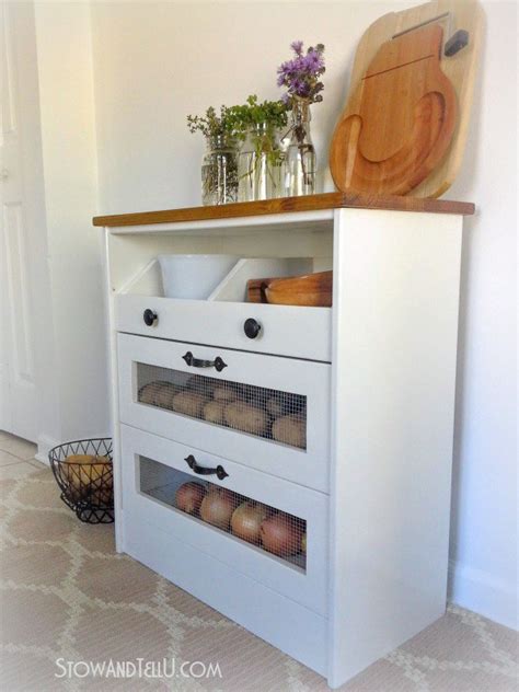 This rustic primitive potato and onion bin is hand made from knotty pine wood, and black hammered hinges. 29 Amazing Farmhouse IKEA Hack Rast Makeovers - The Cottage Market