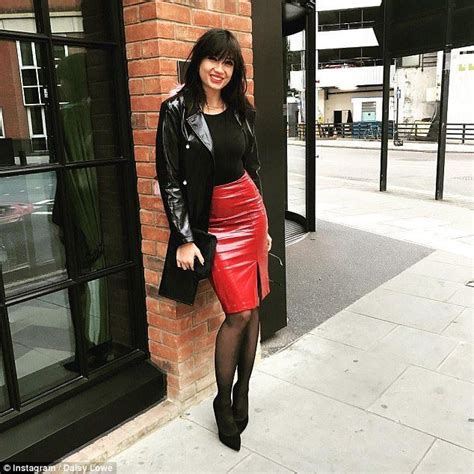 daisy lowe puts on a busty display in sexy leather skater dress
