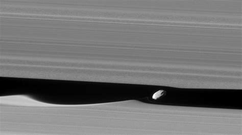 Cassini Captures Closest Ever Photo Of Saturns Moon Daphnis