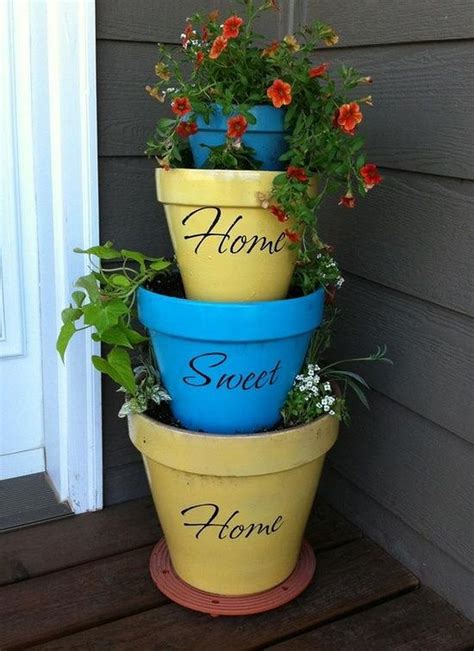 Budget Friendly Garden Projects Made With Clay Pots1 Stacked Flower