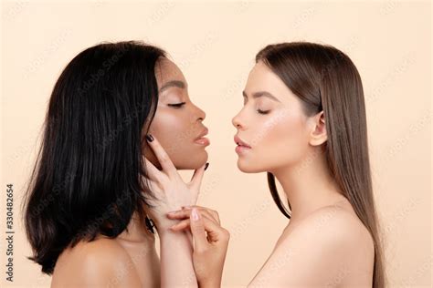 Lesbian Kiss Two Beautiful Waman Couple In Love Cheerful African Lesbian With White Caucasian
