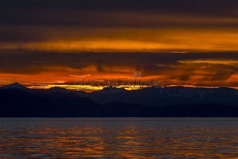 Orange Sunset Over Mountains Alaska Stock Photo Image Of Background