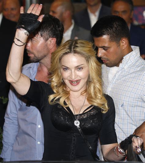 madonna grill singer wears gold piece in rome photos enstars