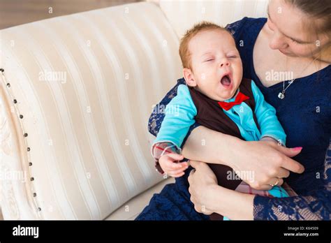 Tired Newborn Baby Boy Yawns Stock Photo Alamy