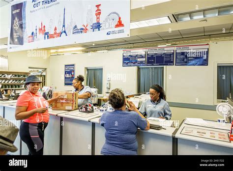 Black Woman Female Employee Postal Clerk Hi Res Stock Photography And