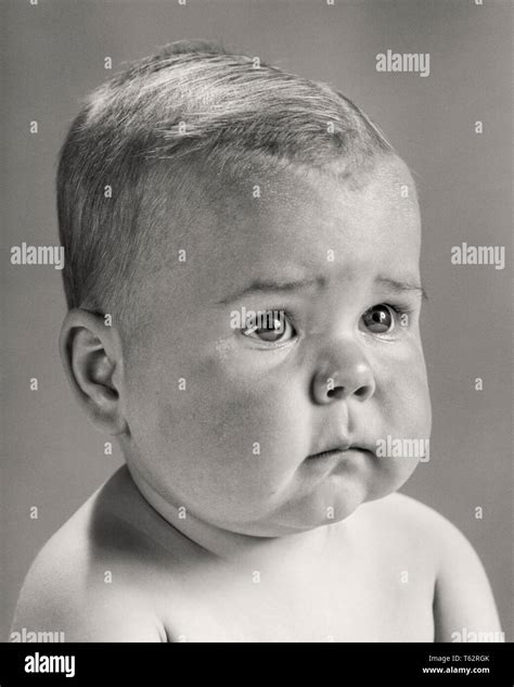1960s Baby With Serious Facial Expression B23154 Har001 Hars Black