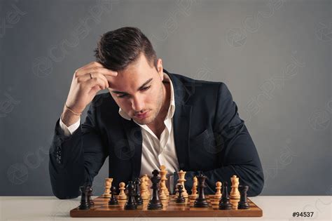 Man Playing Chess Isolated On Dark Background Stock Photo 94537