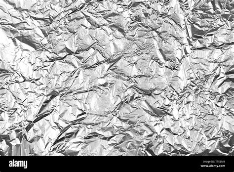 Silver Crumpled Foil Background Stock Photo Alamy