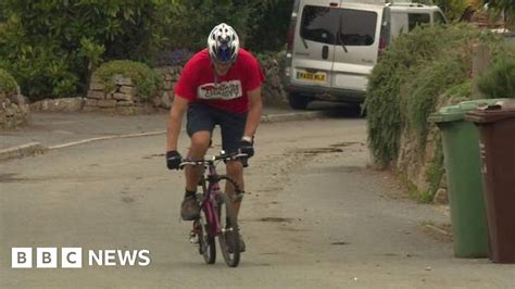 father riding late daughter s tiny bike 200 miles for charity bbc news