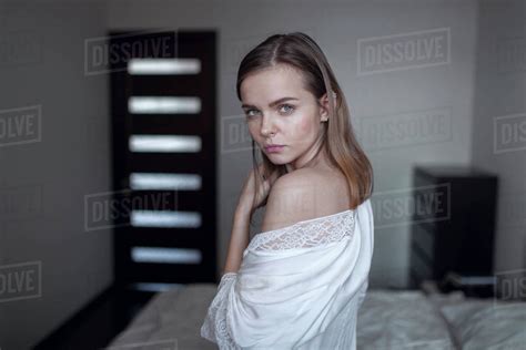 Portrait Of Serious Caucasian Woman In Bedroom Stock Photo Dissolve