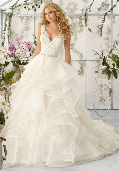 That are beach wedding dresses, which are necessary items for beach weddings for their flowing design and silhouette styling. Mori Lee 2805 Wedding Dress | Top wedding dresses, Wedding ...