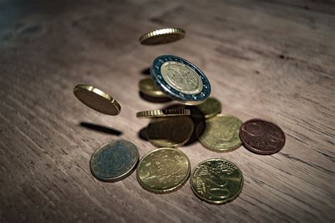 Close Up Of Coins On Table · Free Stock Photo