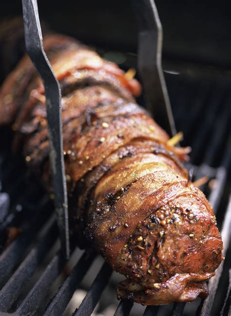 An elegant and flavorful dish for your holidays, family gatherings and coming up. Grilled Bacon Wrapped Pork Tenderloin Recipe