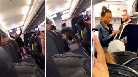 drunk lady flashes her bum in a plane while twerking in front of other passengers photos video