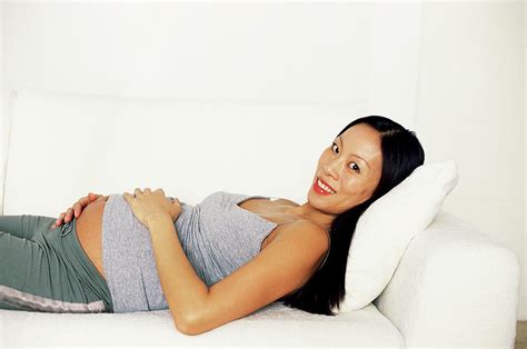 Pregnant Woman Relaxing Photograph By Ian Hooton Science Photo Library