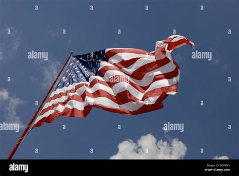 Large American Flag Blowing In The Wind Stock Photo Alamy