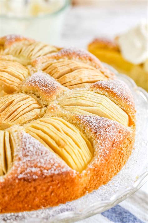 Make kuchen filling by mixing the flour and sugar. This simple Apple Cake is a traditional German dessert ...