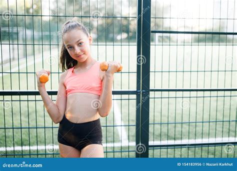 A Young Sympathetic Girl Of Slender Body Dressed In A Form Of Sport
