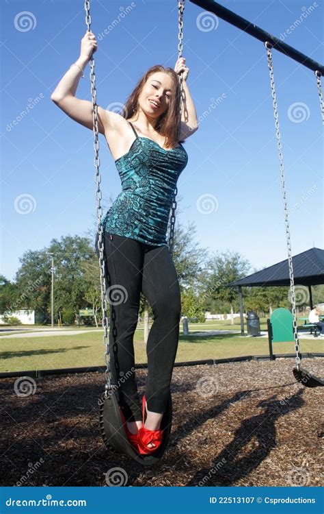 Lovely Voluptuous Brunette On A Swing 4 Stock Image Image Of Playground Jamie 22513107