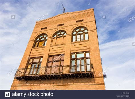 Vintage Brick Building With Boarded Up Windows Stock Photo Alamy