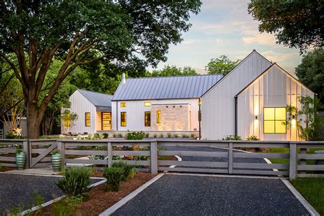 Modern farmhouse with muted interiors. Loving the modern farmhouse!